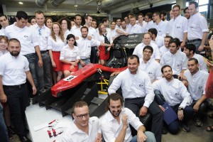 The team of students at the unveiling ceremony for the new Formula car.